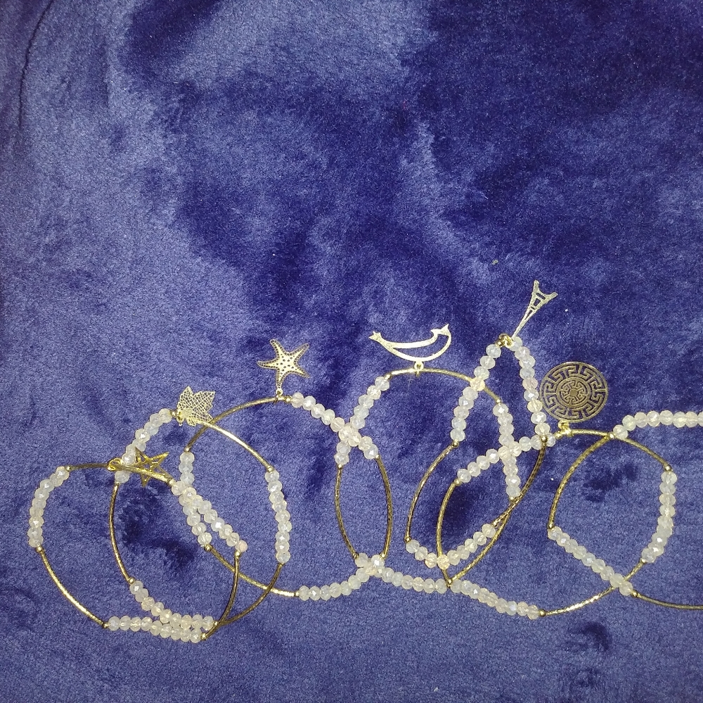 7 stainless steel bracelets with charms